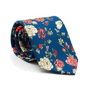 Cravate bleue fleurs beiges et rouges en soie roulée Charlie