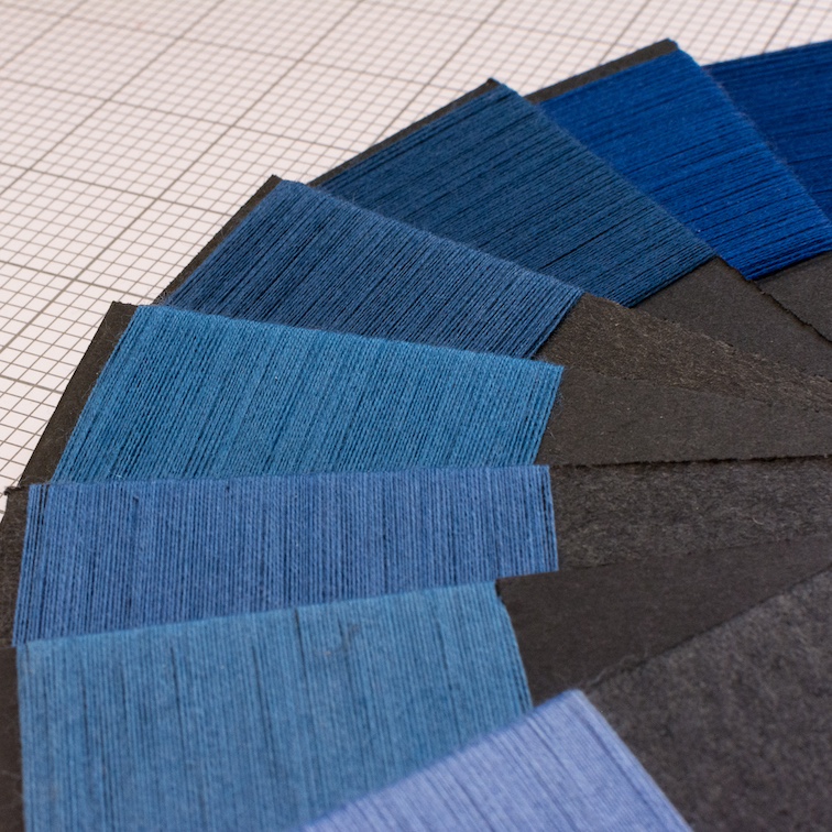 Fibres de laine de mérinos tissées en fils.